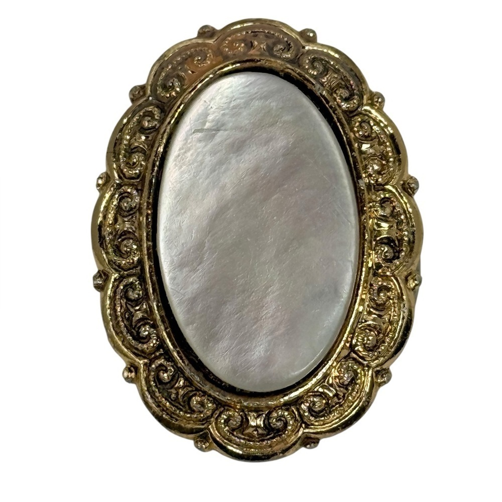 Vintage West Germany oval mother of pearl brooch clip